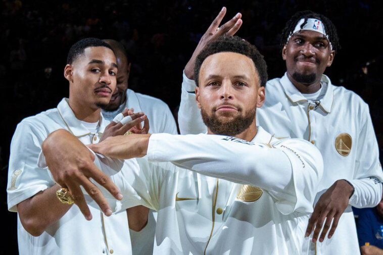 Stephen Curry and his teammates in a shoot.